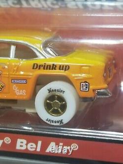 EXCLUSIVE Autoworld Xtraction Ultra G TEQUILA SUNRISE'55 Chevy Bel Air Slot