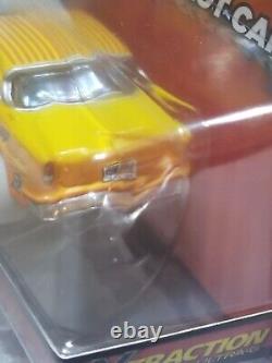 EXCLUSIVE Autoworld Xtraction Ultra G TEQUILA SUNRISE'55 Chevy Bel Air Slot
