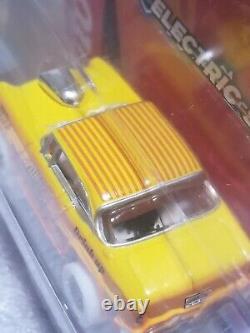 EXCLUSIVE Autoworld Xtraction Ultra G TEQUILA SUNRISE'55 Chevy Bel Air Slot