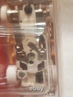 EXCLUSIVE Autoworld Xtraction Ultra G TEQUILA SUNRISE'55 Chevy Bel Air Slot