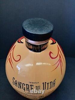 Sangre De Vida Tequila Handpainted YellowithRed Devil Skull Bottle (Empty)