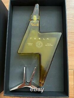 TESLA TEQUILA BOTTLE (empty) with Stand COLLECTIBLE IN HAND