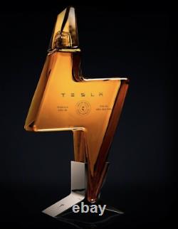 TESLA TEQUILA BOTTLEonly NO ALCOHOL + STAND + BOX LIMITED IN HAND NEW NEW NEW